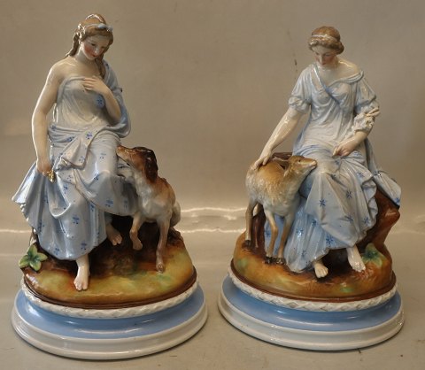 2 Antique European figurines 29 x 18.5 cm Woman with dog and Woman with kid goat